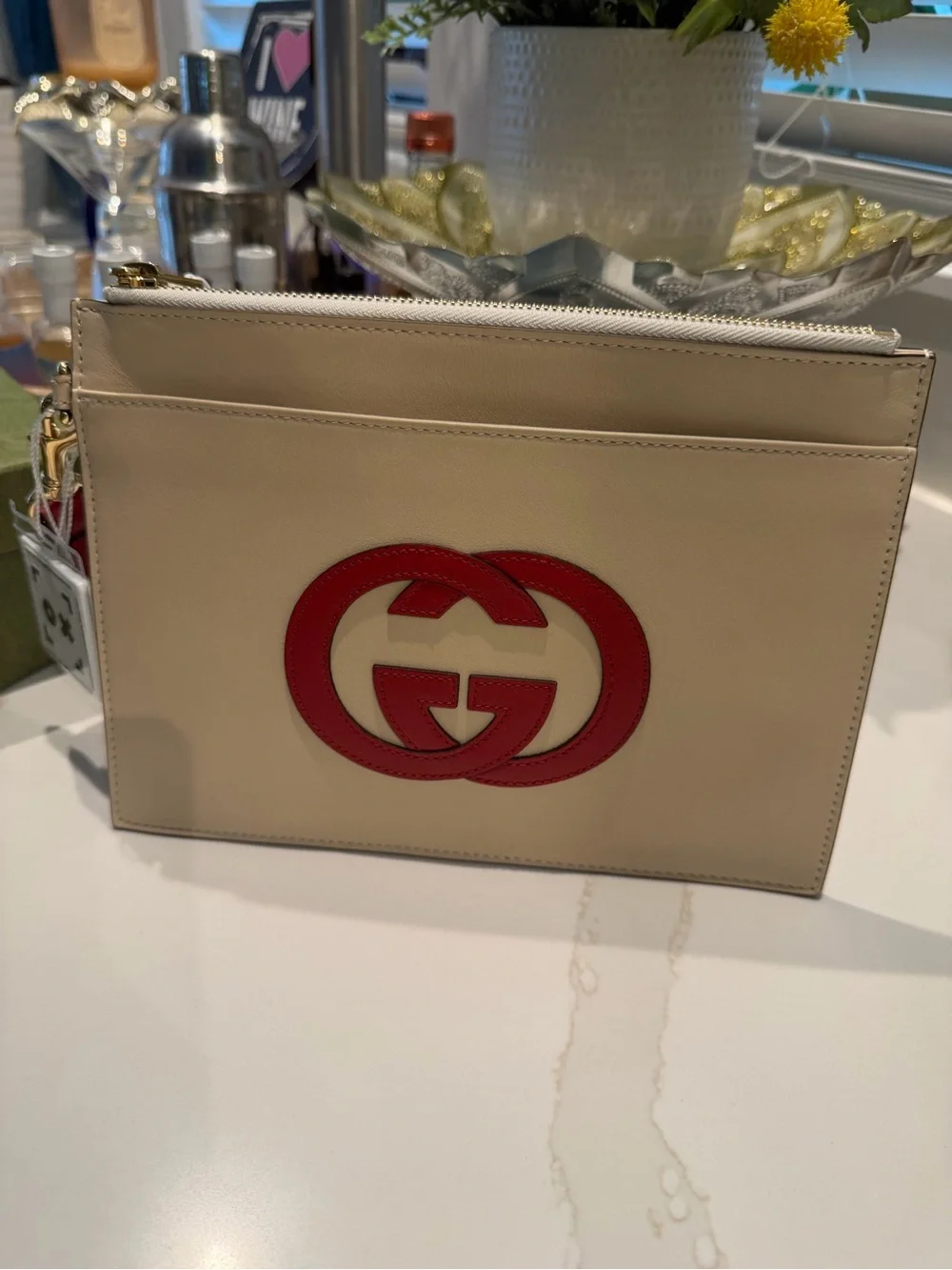 Authentic Gucci Cream Leather Zip Pouch with Red Double G Logo